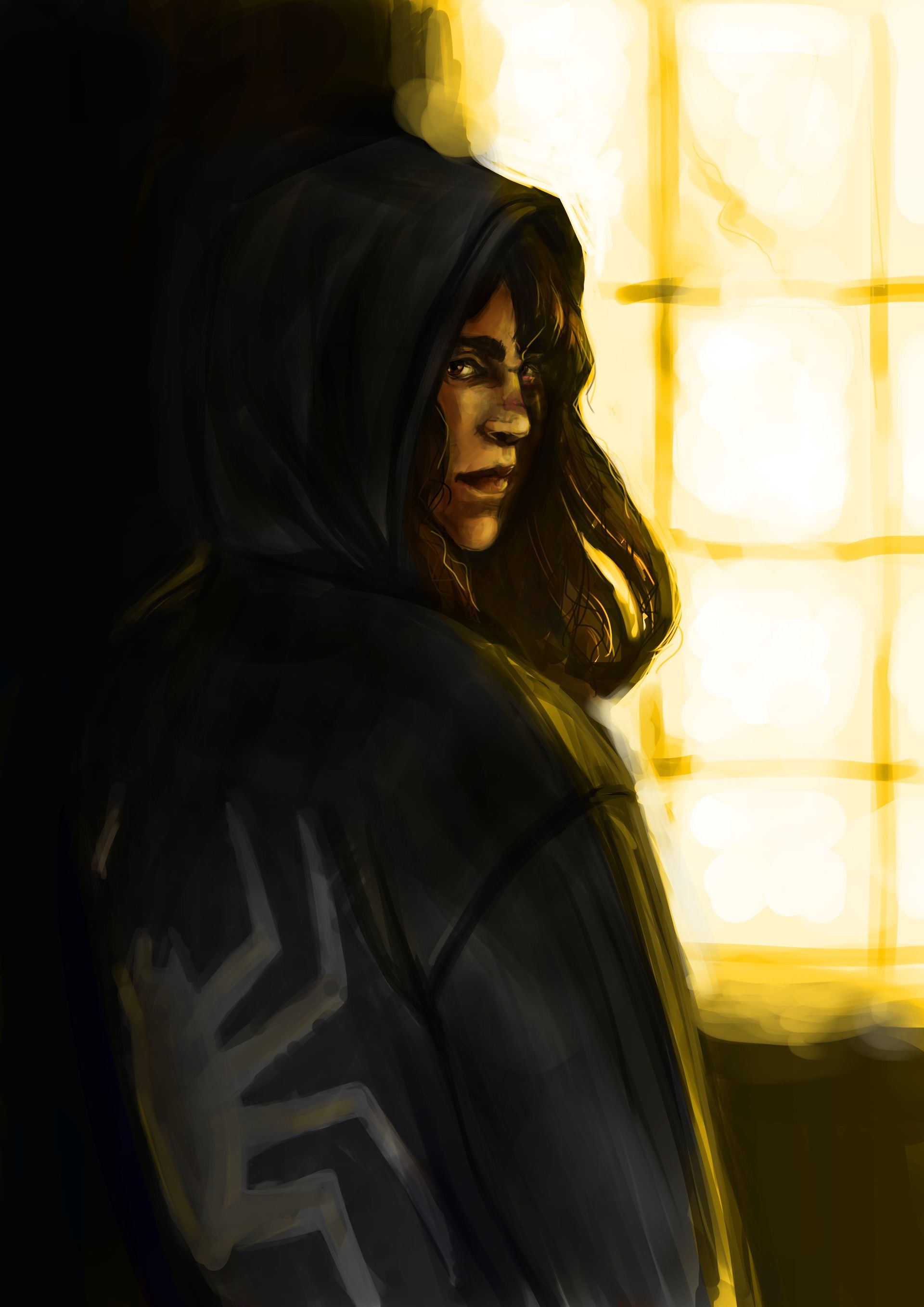 Anya in a hoodie with a spider painted on the back, standing in front of a yellow-tinted window.